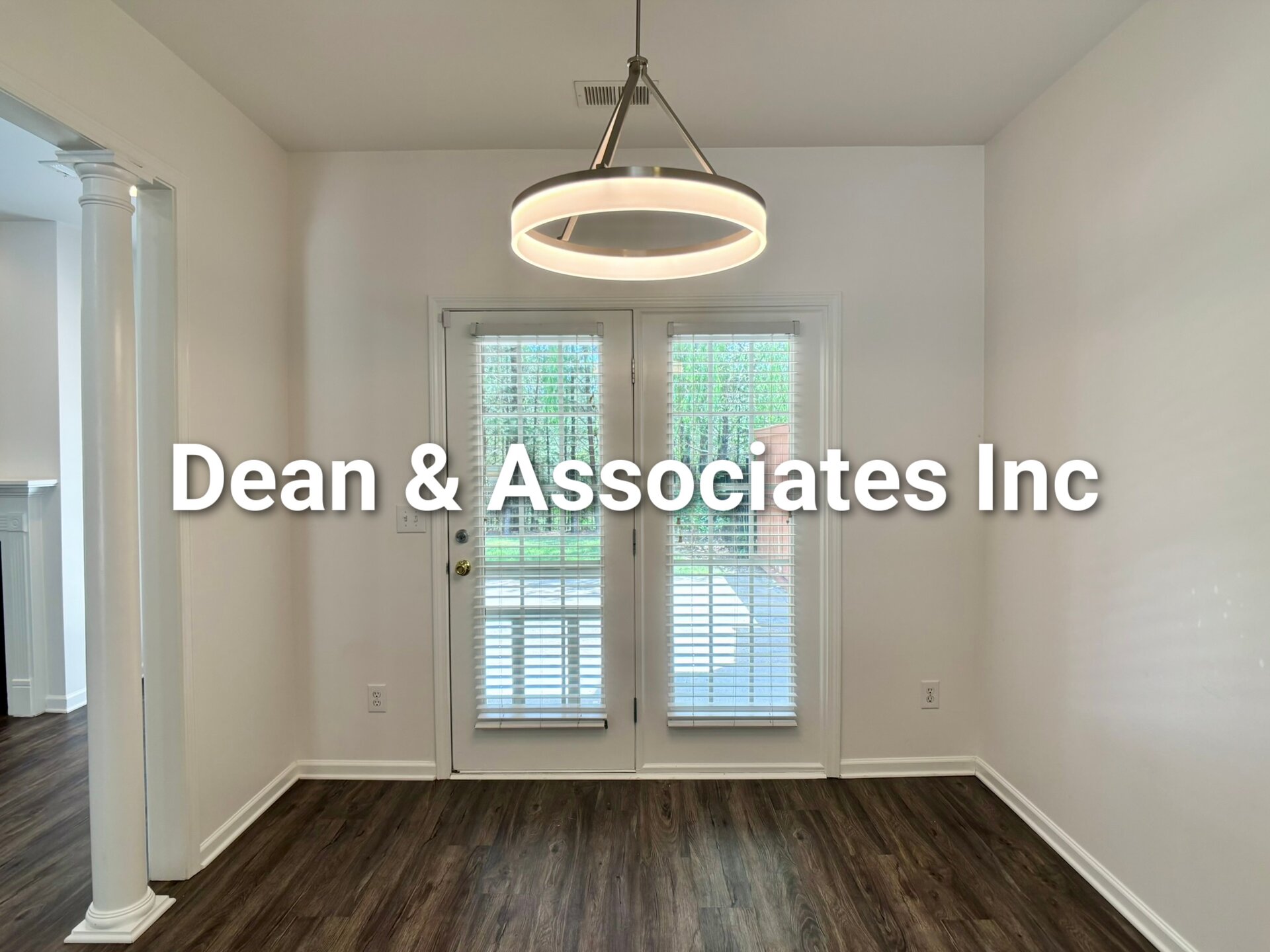 Dining nook with French doors and modern pendant light at 463 Reach Dr townhouse rental in Birmingham, AL
