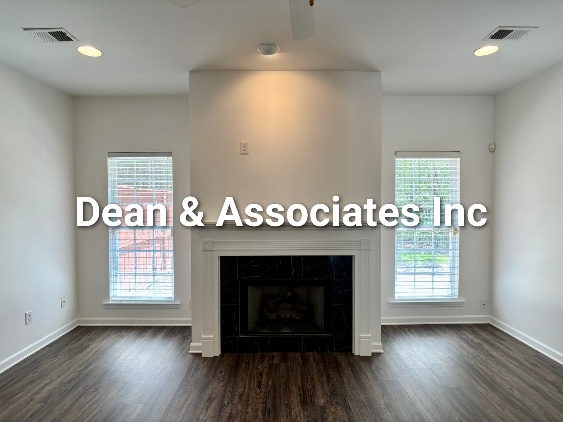 Living room fireplace with tile surround at 463 Reach Dr townhouse rental in Birmingham, Alabama