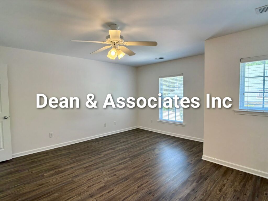 Secondary bedroom with ceiling fan and hardwood floors at 463 Reach Dr townhouse in Birmingham, AL