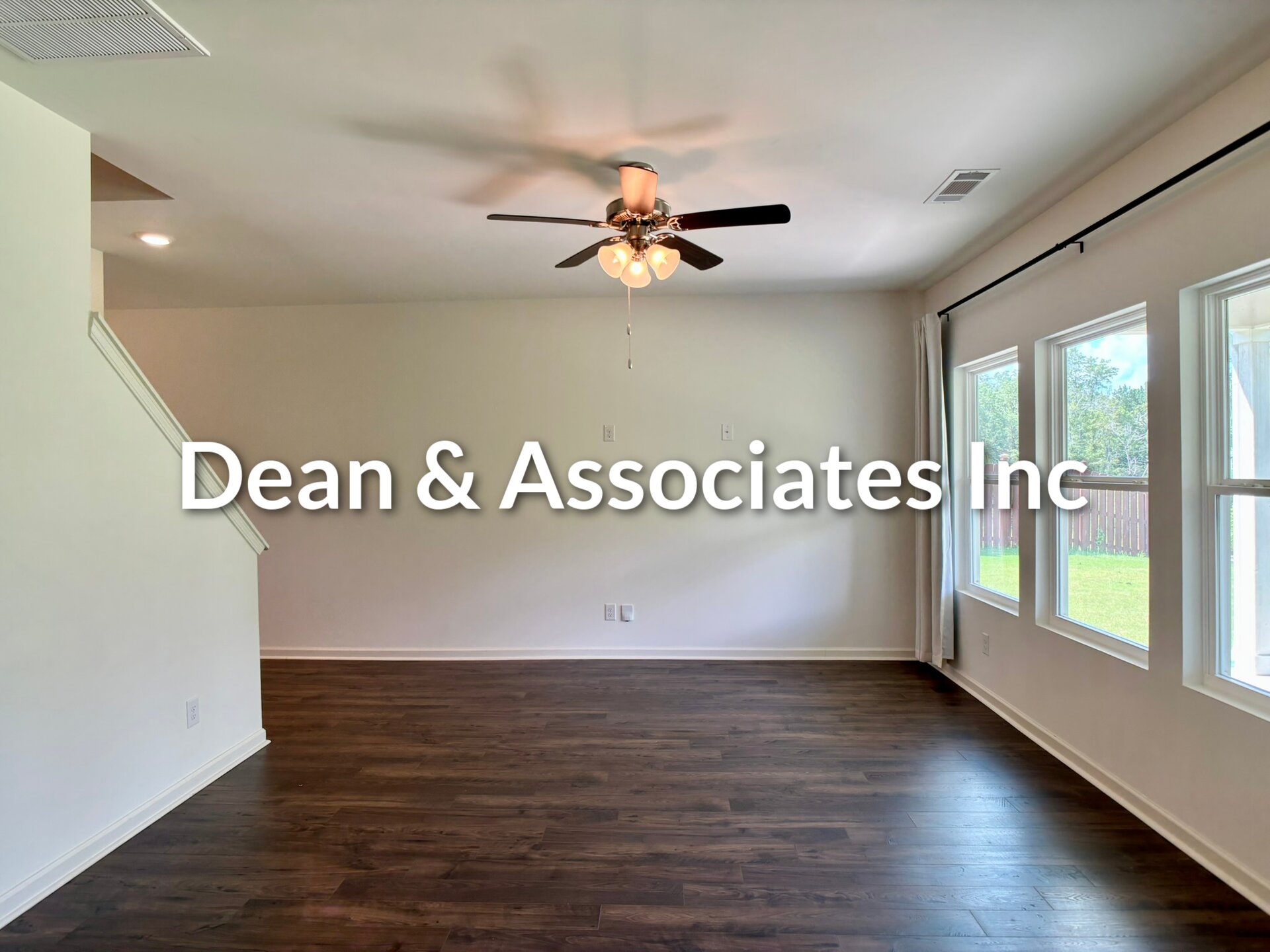 Family room with ceiling fan, hardwood floors, and staircase at 464 Crossbridge Rd in Chelsea, AL