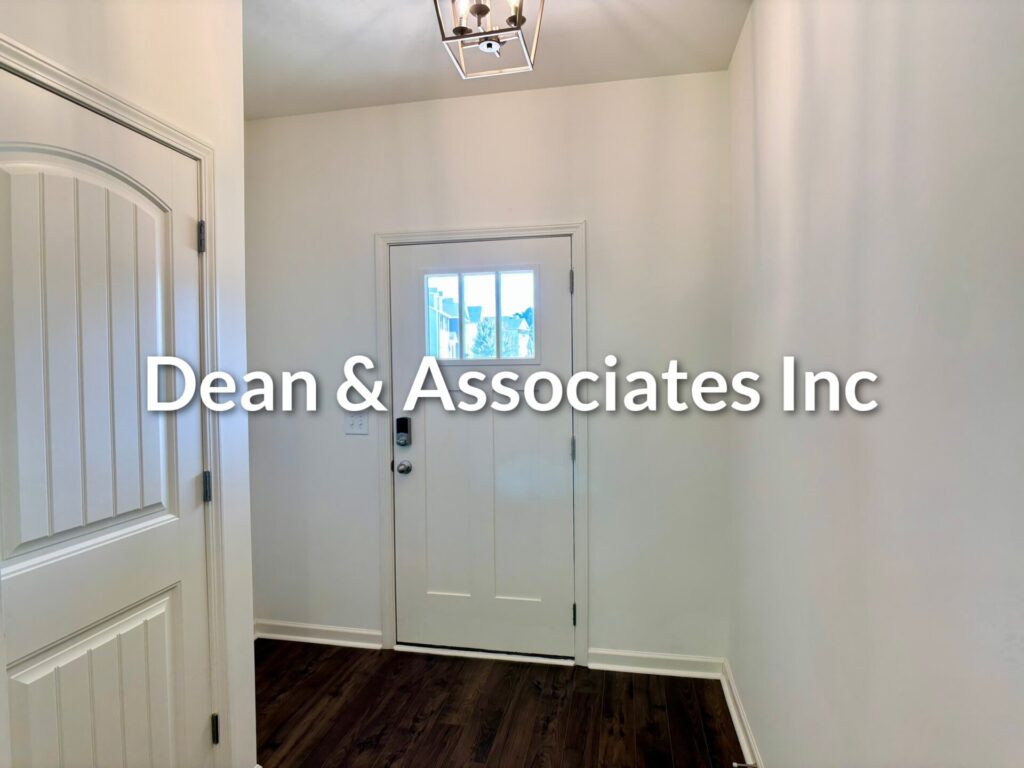 Front entry foyer with hardwood floors and front door at 464 Crossbridge Rd, Chelsea, Alabama