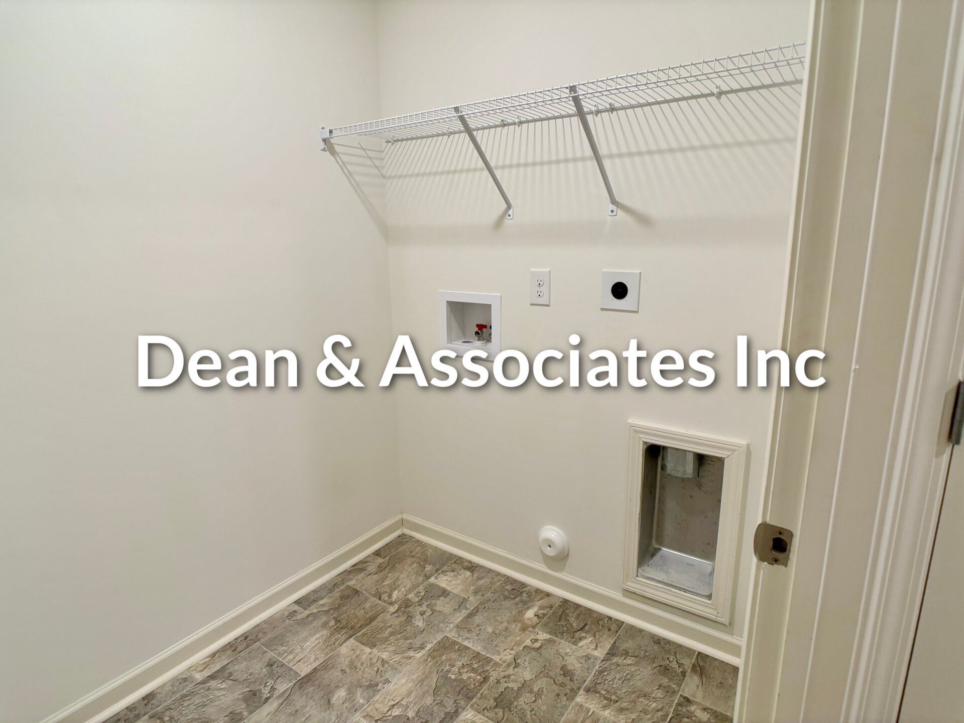 Laundry room with tile floor and overhead shelving at 464 Crossbridge Rd in Chelsea, Alabama