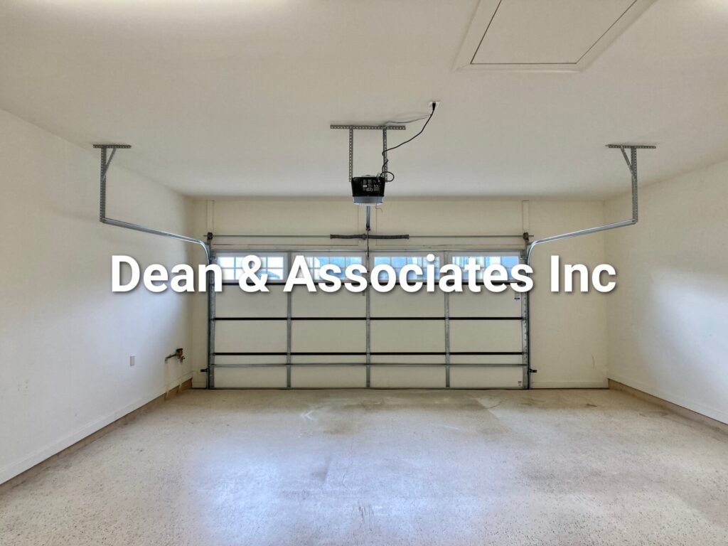 Two-car attached garage interior at 472 Lake Chelsea Way, Chelsea, Alabama rental home