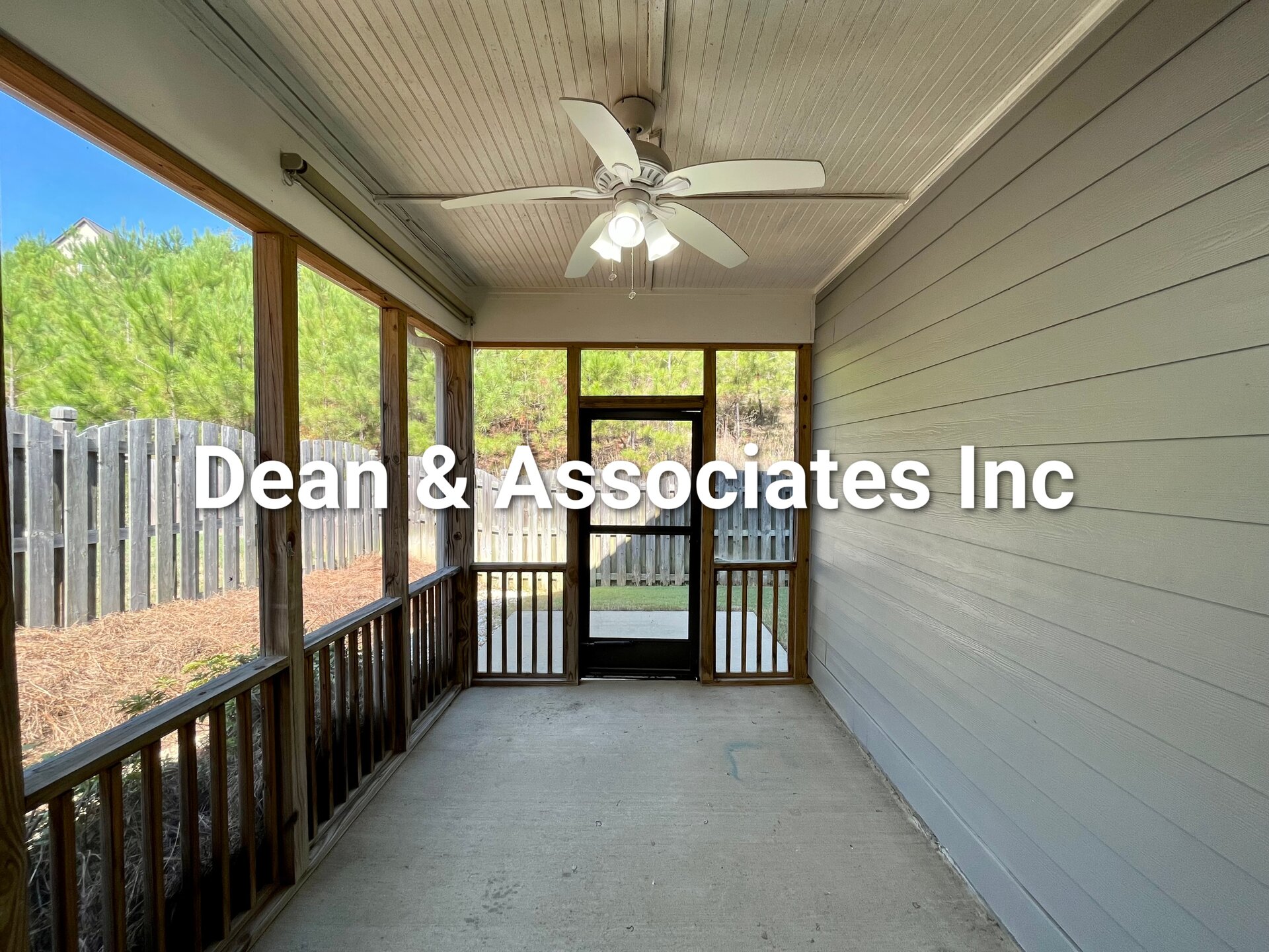Screened rear porch with ceiling fan at 472 Lake Chelsea Way, Chelsea, Alabama
